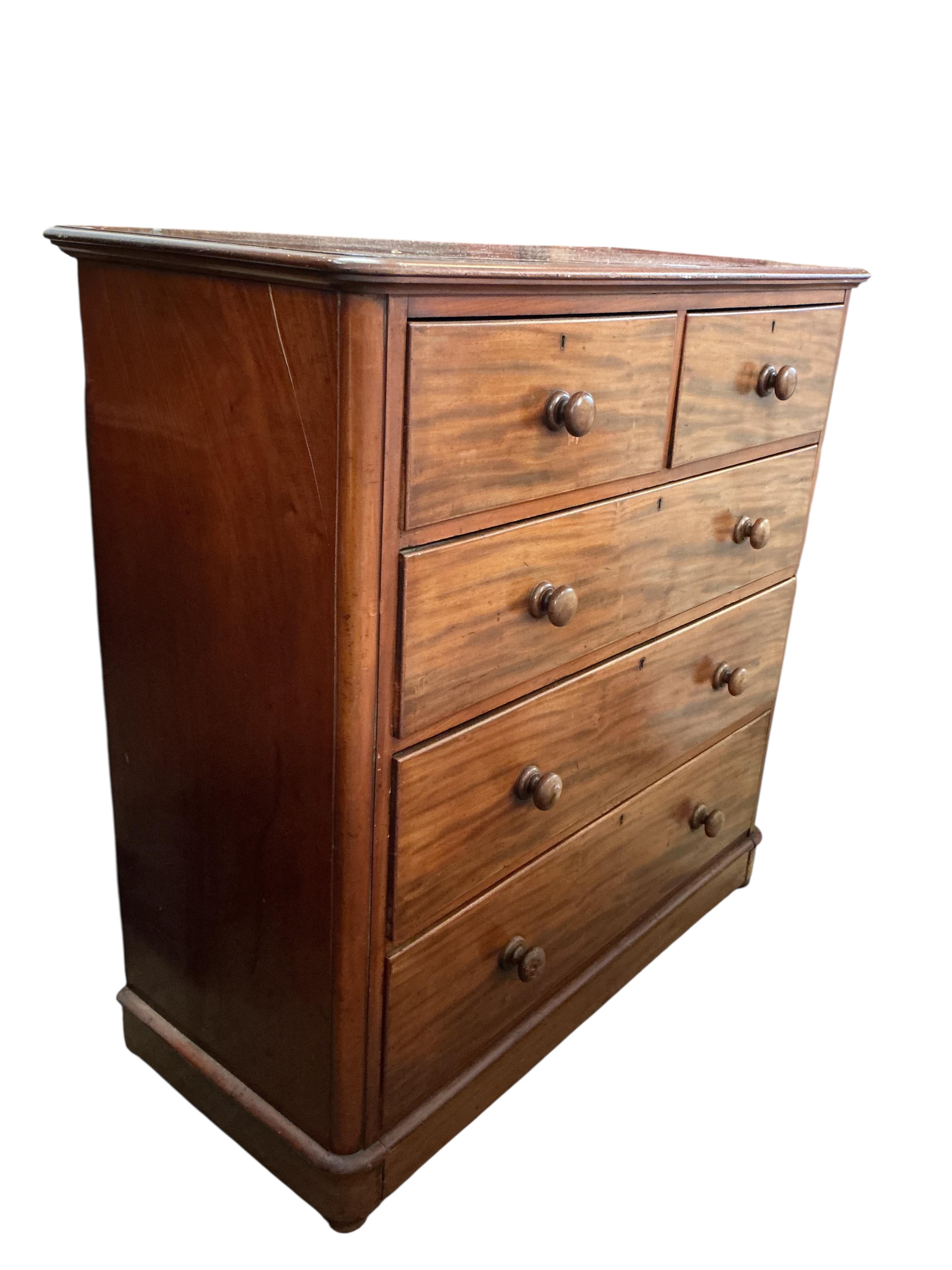 A Victorian mahogany chest, fitted two short and three long drawers, width 118cm, depth 51cm, height 118cm